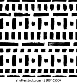 Geometric seamless pattern with vertical and horizontal brush strokes. Hand drawn black straight bold lines with texture. Vector short lines and dashes ornament. Grunge ink brush texture
