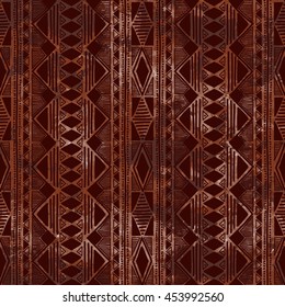 Geometric seamless pattern. Vertical orientation. Brown watercolor stains. Grungy texture. Ethnic and tribal motifs. Vector illustration.
