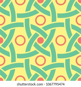 Geometric seamless pattern. Yellow background with pink and green design for wallpapers, textile and fabrics