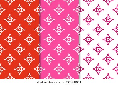 Geometric seamless patterns. Set of red and pink backgrounds for wallpapers and fabrics