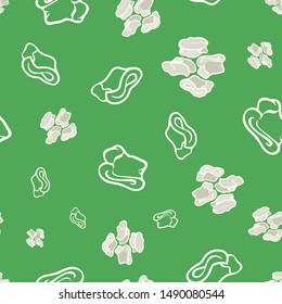 Geometric seamless repeat pattern. Vector illustration of stylized sheep ankle bones in emerald, taupe and cream. Mongolian traditional good luck charm motifs.