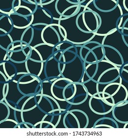 Geometric seamless repeating pattern of blue and green rings