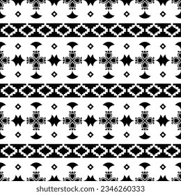 Geometric seamless stripe pattern with Aztec tribal motifs in black and white colors. Abstract background in ethnic style. Design for textile template and print fabric.