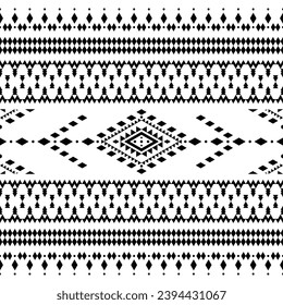 Patrón tribal geométrico sin soldadura tradicional de color blanco y negro. Estilo étnico azteca y navajo. Diseño para cortina, textil, envoltura, tela, ropa, patchwork, batik, textura, ikat.