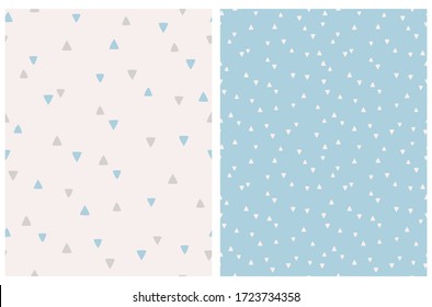 Geometric Seamless Vector Patterns with White Triangles Isolated on a Pastel Blue Background. Simple Lovely Confetti Rain of Triangle Shape. Beige and Blue Elements on an Off-White Backdrop.
