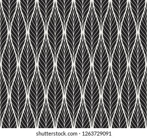 Geometric trendy leaves vector seamless pattern. Abstract symmetry vector texture. Leaf background.