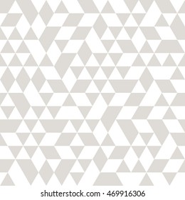 Geometric vector pattern with gray and white triangles. Seamless abstract background