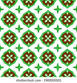 Geometric vector pattern with green and red colors. Seamless abstract ornament for wallpapers and backgrounds.