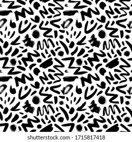 Geometric vector seamless pattern in Memphis style. Grunge brush stroke dots, circles, zig zag lines and dashes. Hand drawn ink illustration. Hipster black paint geometric background. 