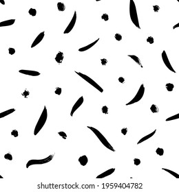 Geometric vector seamless pattern in Memphis style. Grunge tiny brush strokes, dots, circles and dashes. Hand drawn messy ink illustration. Hipster black paint geometric background. 