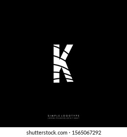 geometric white monogram textured K logotype isolated on black background vector illustration