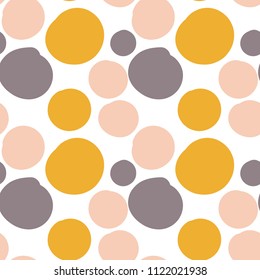 Geometrical background with uneven circles. Abstract round seamless pattern. Hand drawn colorful dots pattern on white background. Vector illustration.