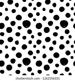 Geometrical background with uneven circles. Abstract round seamless pattern. Hand drawn dots pattern on white background. Vector illustration. 