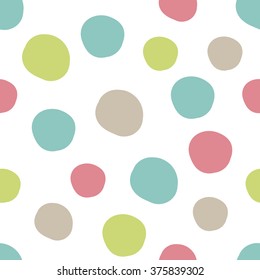 Geometrical background with uneven circles. Abstract round seamless pattern. Hand drawn colorful dots pattern on white background. Vector illustration.
