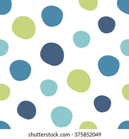 Geometrical background with uneven circles. Abstract round seamless pattern. Hand drawn colorful dots pattern on white background. Vector illustration.
