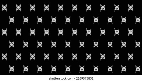 Geometrical pattern design looks like butterfly in black and white design.