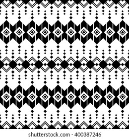 Geometrical seamless pattern with ethnic motives.  Boho style print template for textile, paper, wrapping, gift cards etc. Black and white.
