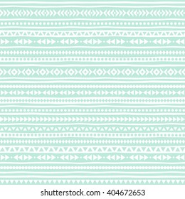 Geometrical seamless vector pattern. Ethnic or tribal background with tiny triangles, uneven stripes and dots. Striped boho texture. Mint green and white.