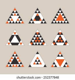 Geometrical tile equilateral triangles icons set - Modern flat design in orange, black, and white on khaki background