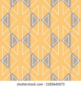 Geometry triangle shape seamless pattern yellow beige delicate color contrast design