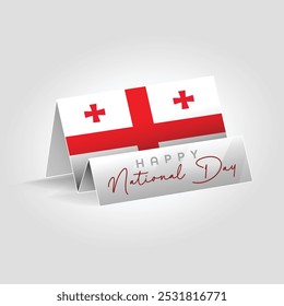 Georgia country paper flag standing on the ground. Happy national day flag design.