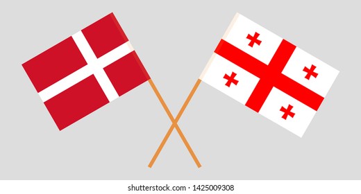 Georgia and Denmark. Crossed Georgian and Danish flags