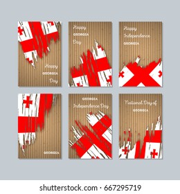 Georgia Patriotic Cards for National Day. Expressive Brush Stroke in Flag Colors on kraft paper background. Vector Greeting Card.