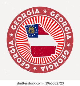 Georgia round stamp. Logo of US state with state flag. Vintage badge with circular text and stars, vector illustration.