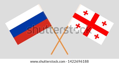 Georgia and Russia. Crossed Georgian and Russian flags