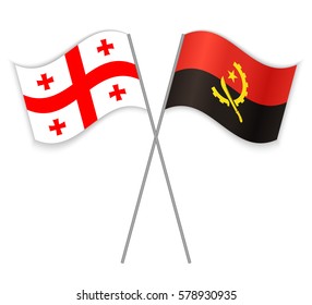 Georgian and Angolan crossed flags. Georgia combined with Angola isolated on white. Language learning, international business or travel concept.