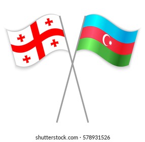 Georgian and Azerbaijani crossed flags. Georgia combined with Azerbaijan isolated on white. Language learning, international business or travel concept.