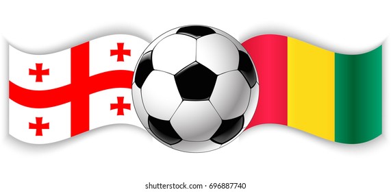 Georgian and Guinean wavy flags with football ball. Georgia combined with Guinea isolated on white. Football match or international sport competition concept.