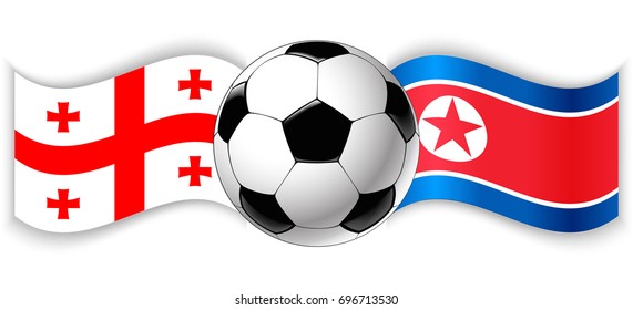 Georgian and North Korean wavy flags with football ball. Georgia combined with North Korea isolated on white. Football match or international sport competition concept.