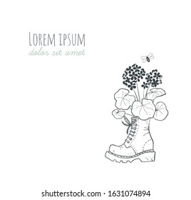 Geranium flower in old boot and a little bee.