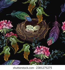 Geranium flowers, color feathers and bird nest. Embroidery seamless pattern. Halloween background. Template for clothes, t-shirt design