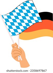 German and Bavarian flag in hand isolated on white background. Arm holding flags celebrating Oktoberfest holiday celebration