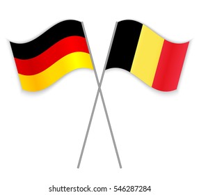 German and Belgian crossed flags. Germany combined with Belgium isolated on white. Language learning, international business or travel concept.