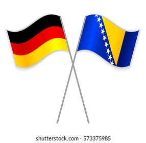 German and Bosnian crossed flags. Germany combined with Bosnia and Herzegovina isolated on white. Language learning, international business or travel concept.