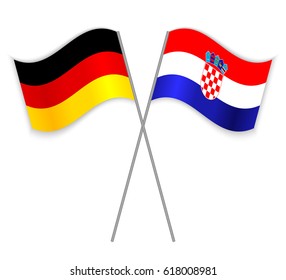 German and Croatian crossed flags. Germany combined with Croatia isolated on white. Language learning, international business or travel concept.