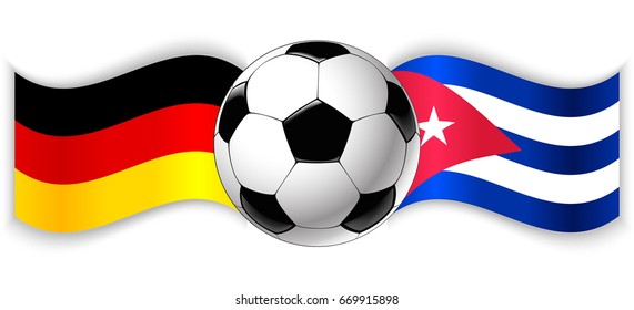 German and Cuban wavy flags with football ball. Germany combined with Cuba isolated on white. Football match or international sport competition concept.
