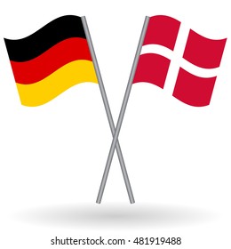 German and Danish crossed flags. Germany combined with Denmark isolated on white. Language learning, international business or travel concept.