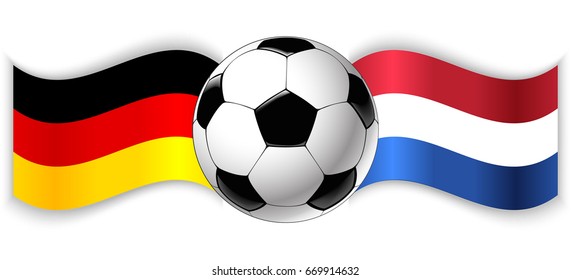 German and Dutch wavy flags with football ball. Germany combined with Netherlands isolated on white. Football match or international sport competition concept.