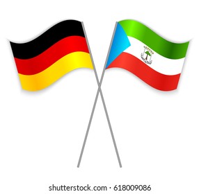 German and Equatorial Guinean crossed flags. Germany combined with Equatorial Guinea isolated on white. Language learning, international business or travel concept.