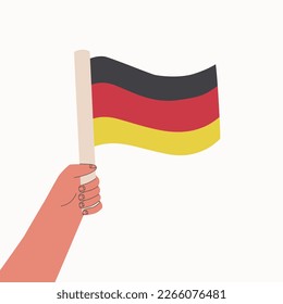German flag. The hand holds the national flag of the country. Vector cartoon illustration.