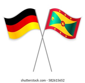 German and Grenadian crossed flags. Germany combined with Grenada isolated on white. Language learning, international business or travel concept.