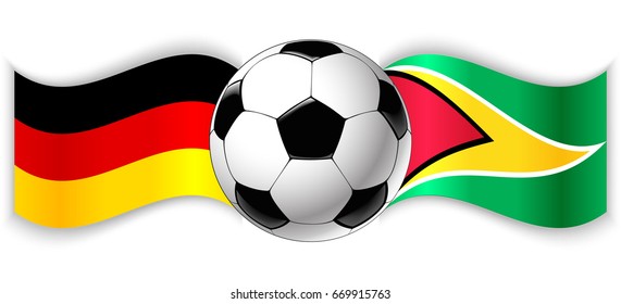 German and Guyanese wavy flags with football ball. Germany combined with Guyana isolated on white. Football match or international sport competition concept.