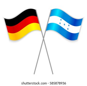 German and Honduran crossed flags. Germany combined with Honduras isolated on white. Language learning, international business or travel concept.