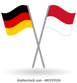 German and Indonesian crossed flags. Germany combined with Indonesia isolated on white. Language learning, international business or travel concept.