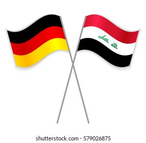 German and Iraqi crossed flags. Germany combined with Iraq isolated on white. Language learning, international business or travel concept.