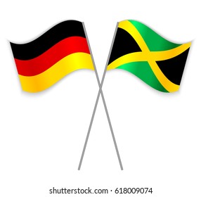 German and Jamaican crossed flags. Germany combined with Jamaica isolated on white. Language learning, international business or travel concept.
